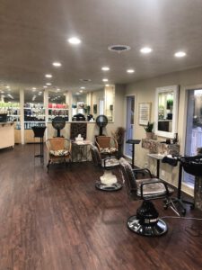 - Results Salon and Spa in Kingsport, TN A well-lit hair salon with wooden floors, styling chairs, hair dryers, mirrors, and shelves stocked with hair products. - Results Salon and Spa in Kingsport, TN