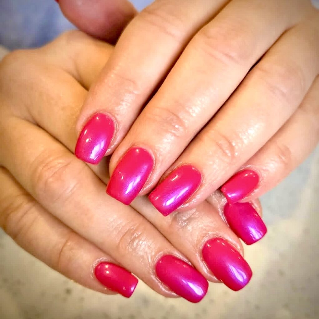 - Results Salon and Spa in Kingsport, TN Close-up of two hands with neatly manicured fingernails painted in shiny, bright pink polish. - Results Salon and Spa in Kingsport, TN
